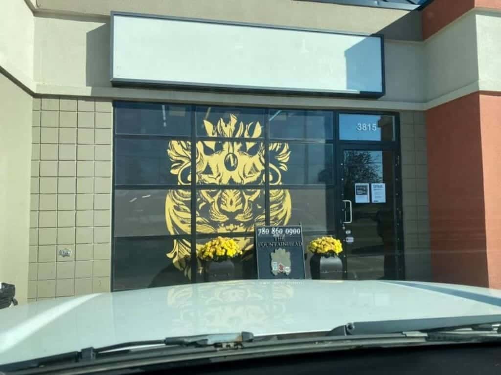Performance Signs, custom multi-window signage display for local Edmonton buisness